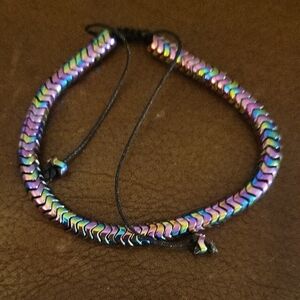 The Hand Crafted Rainbow Hematite Bracelet Adjustable Black Cord
